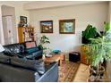 Inviting living room with a large leather couch and an abundance of natural light at 1400 Lee Hill Dr # 1, Boulder, CO 80304