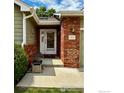 Close up of brick pillar and front door at 1515 Tulip Ct, Longmont, CO 80501