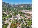 Aerial view of property showcasing location with mountain views and a vibrant neighborhood at 1519 16Th St, Boulder, CO 80302