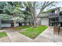 Landscaped common area showcasing well-maintained lawns and mature trees, perfect for relaxing at 3255 34Th St # 42, Boulder, CO 80301