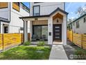 Charming home with a welcoming front entrance and well-maintained landscaping at 1578 Lowell Blvd # 1, Denver, CO 80204