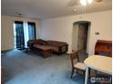 Bright living room with lots of space, gray carpet, and lots of natural light at 50 19Th Ave, Longmont, CO 80501