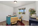 Bright office space with natural light, unique furnishings, and hardwood floors at 5869 Vinca Ave, Longmont, CO 80504