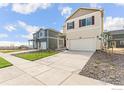 Suburban home with a 2-car garage, neutral siding, maroon-colored shutters, and a well-manicured lawn at 1638 Plata St, Lochbuie, CO 80603