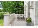 Inviting front porch with seating area and charming planters, perfect for relaxing outdoors at 315 Fairfax St, Denver, CO 80220