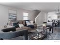 Comfortable living room showcasing stylish furniture and natural light at 3346 N Josephine St, Denver, CO 80205
