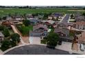 Lovely two-story home with a three-car garage and well-maintained landscaping in a suburban neighborhood at 13598 Horseshoe Cir, Mead, CO 80542
