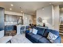 Inviting living room with comfortable seating, stylish decor, and an open concept design at 420 High Point Dr # 102, Longmont, CO 80504