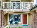 Inviting front entrance with covered porch and seating area, number 12 is visible at 4800 Osage Dr # 12B, Boulder, CO 80303