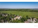 Scenic aerial view of a neighborhood, backing to a greenbelt, and a view of the horizon at 5695 Aurora Pl, Boulder, CO 80303