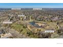 Aerial view of neighborhood and surrounding amenities, including walking path and park at 1449 Adams Pl, Louisville, CO 80027