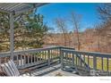 Relaxing balcony featuring scenic views and comfortable seating area at 1449 Adams Pl, Louisville, CO 80027