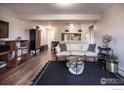 Open-concept living room with hardwood floors and contemporary decor at 2636 Juniper Ave # 39-2, Boulder, CO 80304