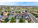 Beautiful neighborhood featuring manicured lawns, mature trees, and well-maintained homes in a wonderful community at 3717 Desert Ridge Cir, Castle Rock, CO 80108