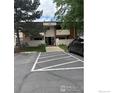 Apartment building with parking space out front at 5102 Williams Fork Trl # 205, Boulder, CO 80301
