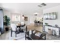 Open living space with a dining table, breakfast bar, and comfortable seating area at 800 Mohawk Dr, Boulder, CO 80303