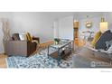 Comfortable living area seamlessly connects to dining space at 252 N Pennsylvania St # 305, Denver, CO 80203