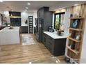 Open-concept kitchen featuring modern appliances, sleek countertops, and ample cabinet space at 6969 Harvest Rd, Boulder, CO 80301