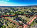 Rural land and home outlined in red for marketing purposes at 8586 N 55Th St, Boulder, CO 80301