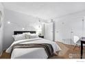 Spacious bedroom features a cozy bed, soft lighting, and ample closet space for comfortable living at 3363 Madison Ave # 121, Boulder, CO 80303