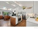 Bright kitchen features skylights, stainless steel appliances and a wooden island at 2652 Sherwood Cir, Boulder, CO 80304