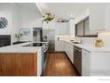 Bright kitchen features skylights, stainless steel appliances and a wooden island at 2652 Sherwood Cir, Boulder, CO 80304