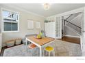 Bright playroom with a table, chairs, and storage, perfect for creative play at 952 Pinecliff Dr, Erie, CO 80516