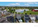 Aerial view of property showing location close to the pond and park at 10604 Reunion Pkwy, Commerce City, CO 80022