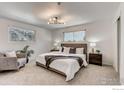 Spacious main bedroom featuring ample natural light, and neutral colors and decor at 12802 E Nevada Cir, Aurora, CO 80012