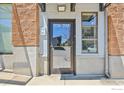 Close-up of a building entrance with unit numbers 236-237, showcasing a modern exterior at 1200 Yarmouth Ave # 237, Boulder, CO 80304