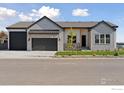 Inviting single-Gathering home with a well-maintained lawn and a spacious three-car garage at 1425 Burt Ave, Berthoud, CO 80513