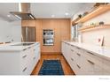 Modern kitchen with stainless steel appliances, sleek countertops, and plenty of cabinet space at 3490 16Th Cir, Boulder, CO 80304