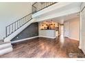 Spacious living room featuring hardwood floors and staircase at 4771 White Rock Cir # B, Boulder, CO 80301