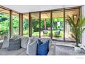 Relaxing living room features comfortable sofa, large windows with backyard views, and stylish decor at 525 13Th St, Boulder, CO 80302