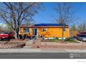 Charming home with a well-maintained yard and solar panels on the roof at 7970 Wolff Ct, Westminster, CO 80030
