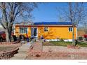 Charming home with a well-maintained yard and solar panels on the roof at 7970 Wolff Ct, Westminster, CO 80030
