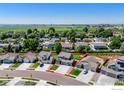 Aerial view highlighting property lines with surrounding lush greenery at 3308 Dryden Pl, Mead, CO 80542