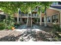 Well-maintained condo complex with lush landscaping and an inviting entrance at 5920 Gunbarrel Ave # D, Boulder, CO 80301