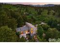Beautiful aerial view of the home nestled amidst verdant greenery, showcasing its unique architecture and tranquil setting at 178 Balsam Ln, Boulder, CO 80304