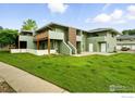 Charming townhouse with beautiful lawn, deck, and easy access at 1900 Chalcis Dr # 42, Lafayette, CO 80026