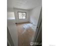 Bedroom featuring natural light and window to the outside at 2919 Riverside Dr, Idaho Springs, CO 80452