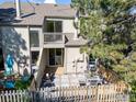 Charming backyard area with a wooden fence and patio, ideal for relaxing at 4863 W Moorhead Cir, Boulder, CO 80305