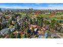 Aerial view showcases the property's proximity to Denver Country Club Golf Course and Cherry Creek at 2111 E Alameda Ave, Denver, CO 80209