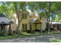 Charming two-story home with inviting curb appeal and mature trees at 832 Neon Forest Cir, Longmont, CO 80504