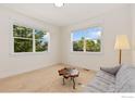 Bright bedroom with large windows offering a pleasant view at 2856 Shadow Lake Rd, Lafayette, CO 80026