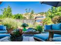 Secluded patio offering outdoor seating, a decorative screen, and a stylish fire feature at 2942 4Th St, Boulder, CO 80304