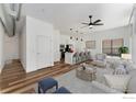Open living space with modern kitchen, comfortable seating, and stylish decor at 3100 Huron St # 1D, Denver, CO 80202