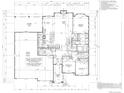 Detailed floor plan showcasing the layout with kitchen, bedrooms, living spaces, garage, and covered patio dimensions and construction details at 1255 Eliza Ave, Berthoud, CO 80513