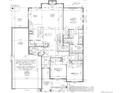 Detailed floor plan of the home showcasing the layout of the kitchen, bedrooms, living spaces, and garage at 1255 Eliza Ave, Berthoud, CO 80513