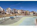 A bright, community playground with colorful play structures and swings offers outdoor fun for residents at 1419 W 67Th Ave, Denver, CO 80221